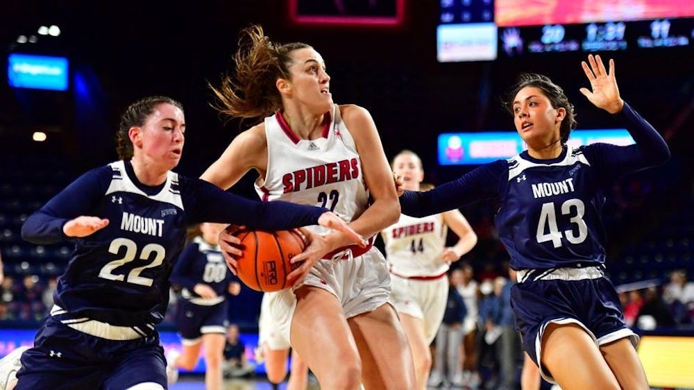 <p>First-year guard Rachel Ullstrom goes up against Mount St. Mary's University's defense on Nov. 10 at the Robins Center. Photo courtesy of Stephen Blue/Richmond Athletics.&nbsp;</p>