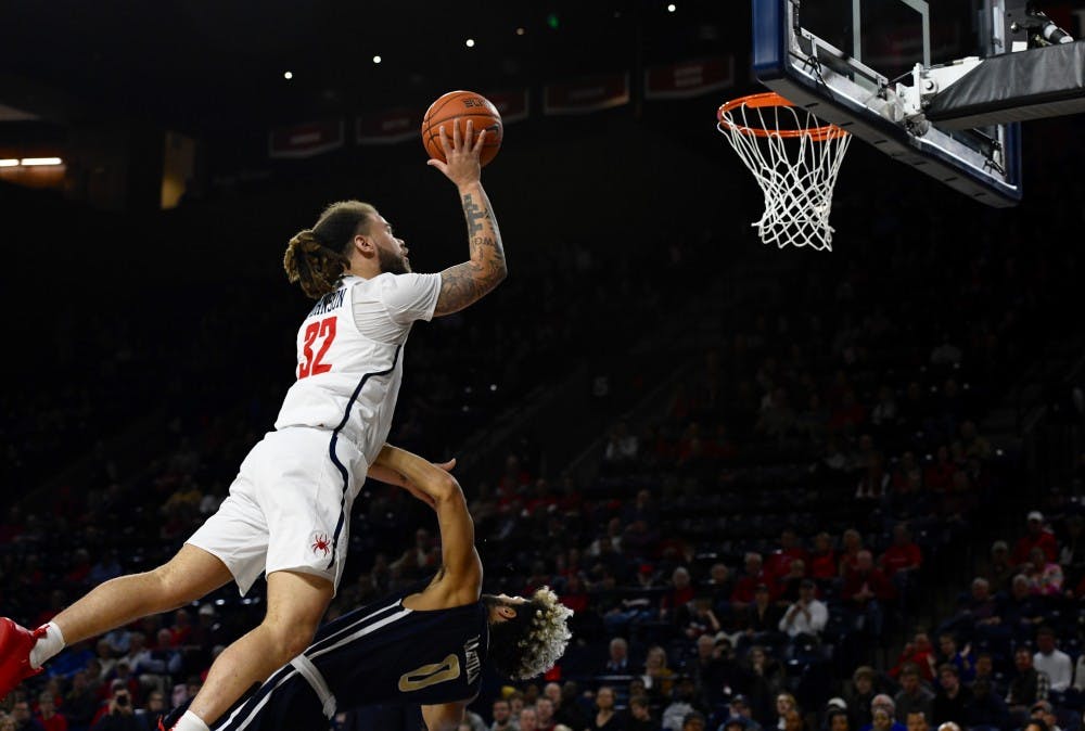 <p>Senior guard Julius Johnson during Saturday night's win against George Washington in the Robins Center.&nbsp;</p>