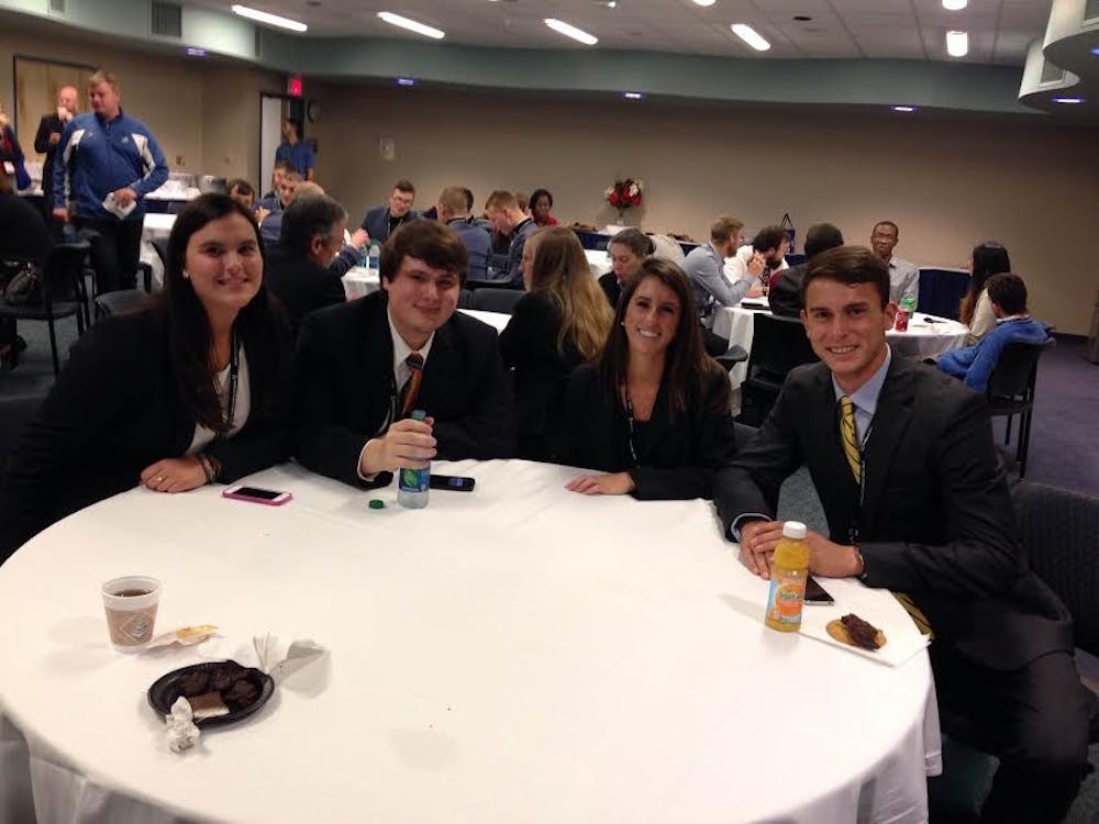 <p>Charlotte Denoyer, Matthew Groff, Maddie Soskin and Mattias Treu compete at the Richmond Ethics Bowl.</p>