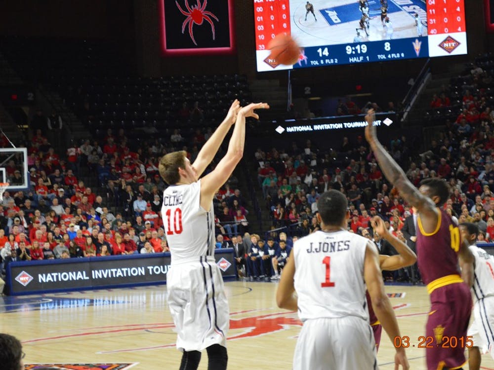 TJ Cline shoots a 3-pointer during the first half. Cline finished with 19 points.