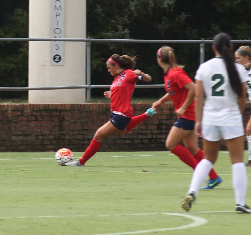 <p>Ashley Riefner takes a strong rip at the ball during Sunday's game against Cal Poly, which the Spiders lost 0-1. Photo courtesy of Richmond Athletics PR. </p>