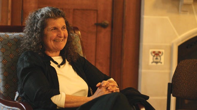 Arlene Blum who is a guest speaker for Women in Mathematics and Science Initiative is telling her audience about her book. 