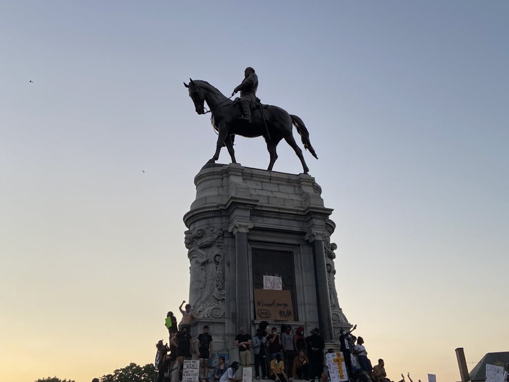 Protesters gather outside Robert E. Lee statue on Monument Avenue at 8:30 p.m. on the evening of June 2.