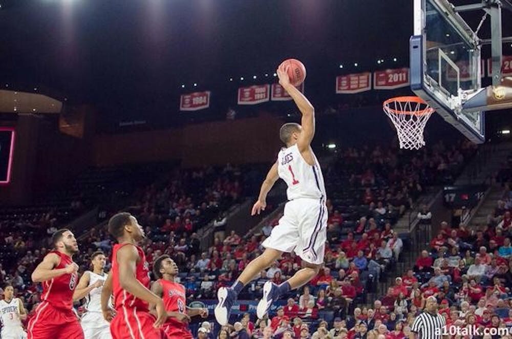 <p>Josh Jones electrifies the Robins Center crowd with a fastbreak dunk. His dunk was the subject of numerous tweets, which included pictures and videos of the play. </p>