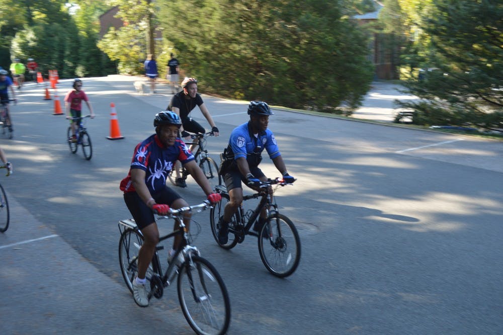 Ronald Crutcher, university president, led dozens of riders around Richmond's campus for the first Presidential 5K Bike Ride, kicking off spirit week that will lead up to Sunday's big race. Photos by Jack Nicholson.