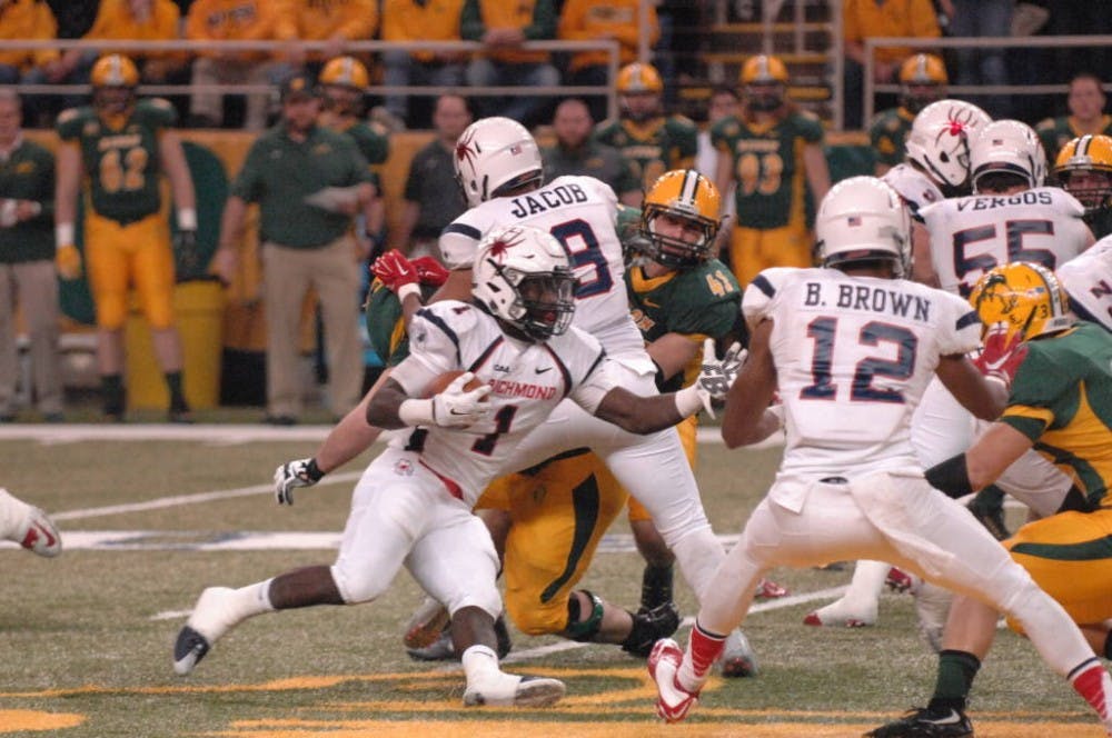 <p>Jacobi Green, No. 1, and Brian Brown were two of Richmond's best players in a 2015 season that ended on Friday night in North Dakota. <strong>Photo courtesy of Richmond Athletics</strong></p>