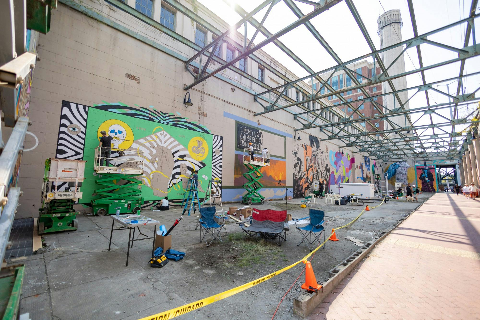 The RVA Street Art Festival took place from Sept. 16-18, marking its 10th anniversary. The festival brings in numerous artists from the community to create murals at designated locations. This year, event organizers decided to return to their roots and take the festival back to the now-famous Canal Walk Power Plant. Over the course of the three-day event, attendees watched as the old murals were covered up by new ones painted by a group of new and returning artists, including Hamilton Glass, who painted a mural in the University of Richmond’s Multicultural Space.&nbsp;

The festival aims to showcase local and national talent while revitalizing areas of the city. Organizers also use the event to support children’s art education in the surrounding area.