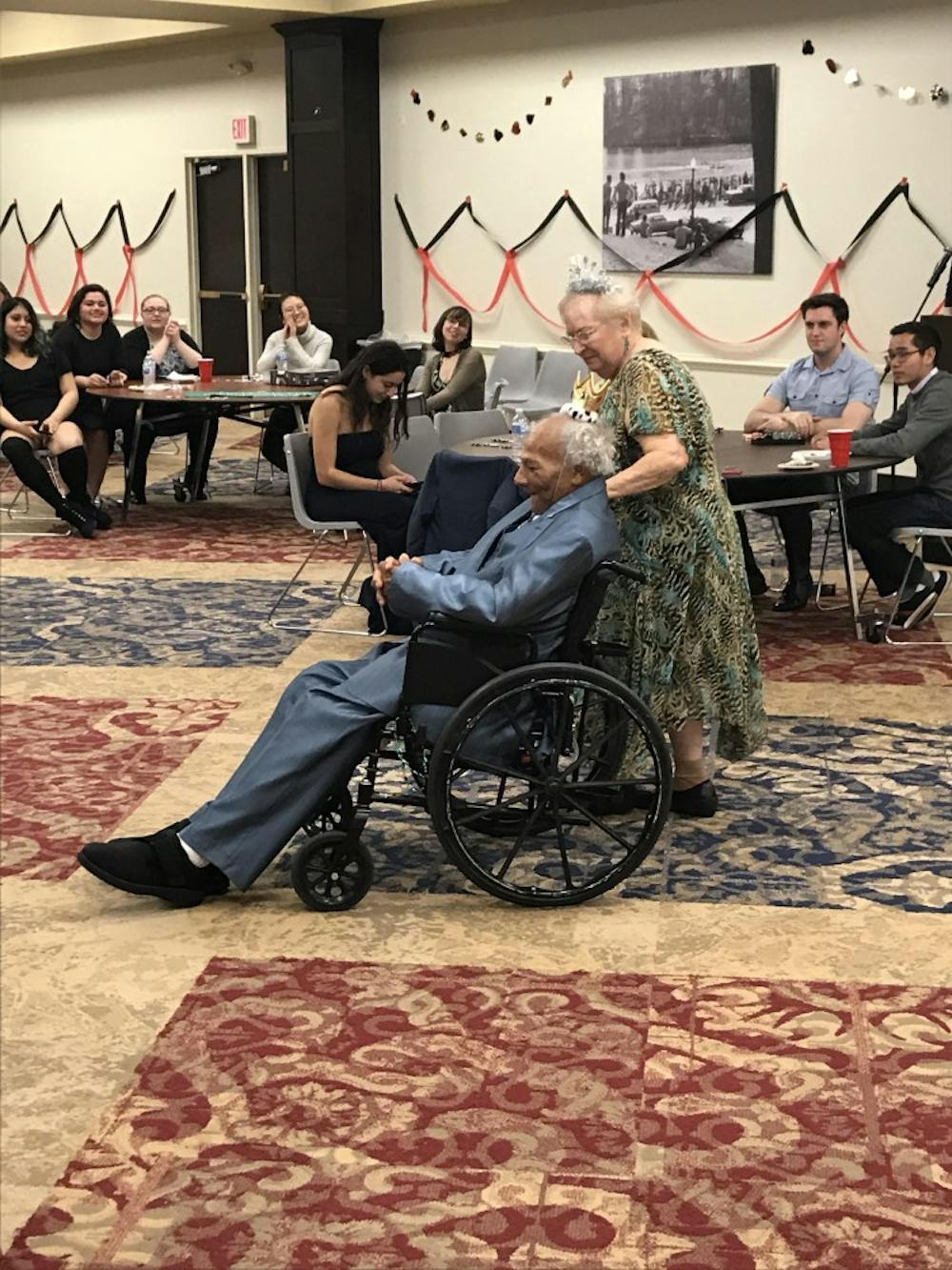 <p>Two Richmond senior citizens dance together at a prom hosted by Alpha Phi Omega in the Alice Haynes Room.&nbsp;</p>