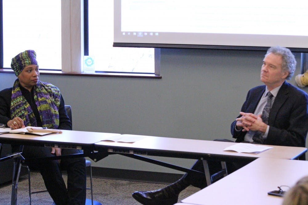 <p>President Emeritus Edward Ayers, right, and Lauranett Lee, adjunct assistant professor at the Jepson School of Leadership Studies, left, speak at a talk on Martin Luther King Jr. Day.&nbsp;</p>