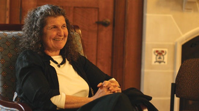 Arlene Blum who is a guest speaker for Women in Mathematics and Science Initiative is telling her audience about her book. 