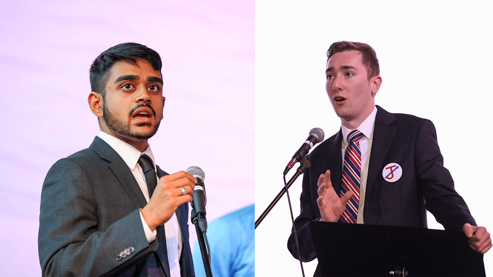 <p>Richmond College presidential candidates Arju Patel (left) and Joseph Coyle (right) debate at the Current on Mach 21.</p>