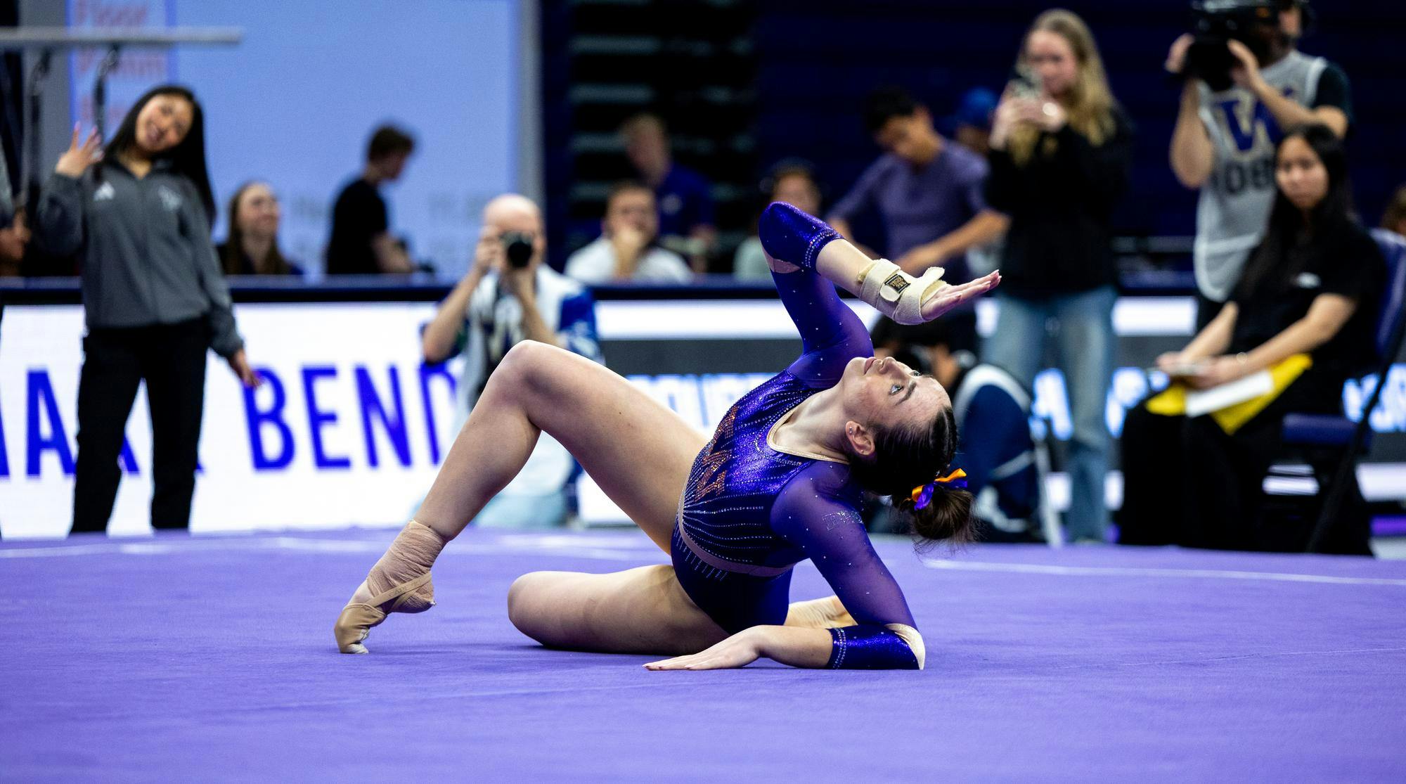 Washington gymnastics storms back, but Illinois slips away with a