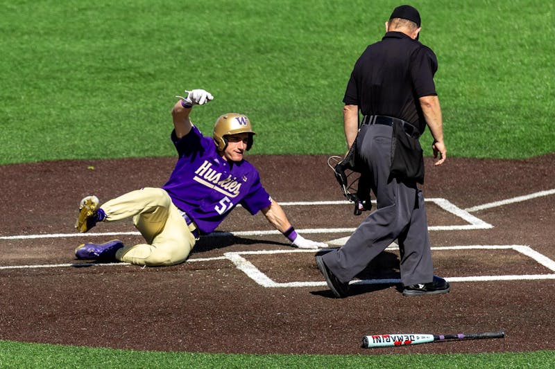 Washington salvages series finale with 7-5 win over Michigan