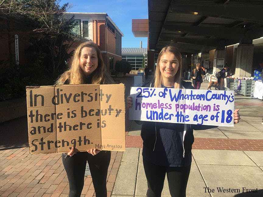Gruber-left-and-Blair-right-with-their-signs-1