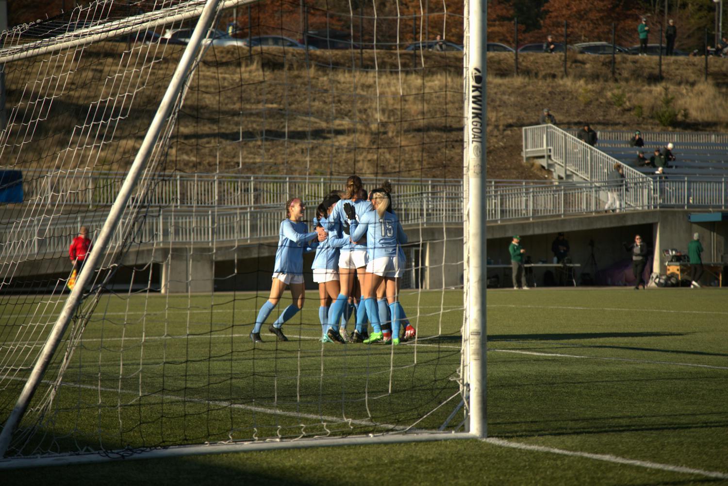 Western women’s soccer team celebrates after an early goal from Morgan Manalili in their game against Concordia University Irvine on Thursday, Nov. 17 at Harrington Field. The only score of the match led to a Viking victory and their fifth regional Division II championship in program history. // Photo by Jack Glenn