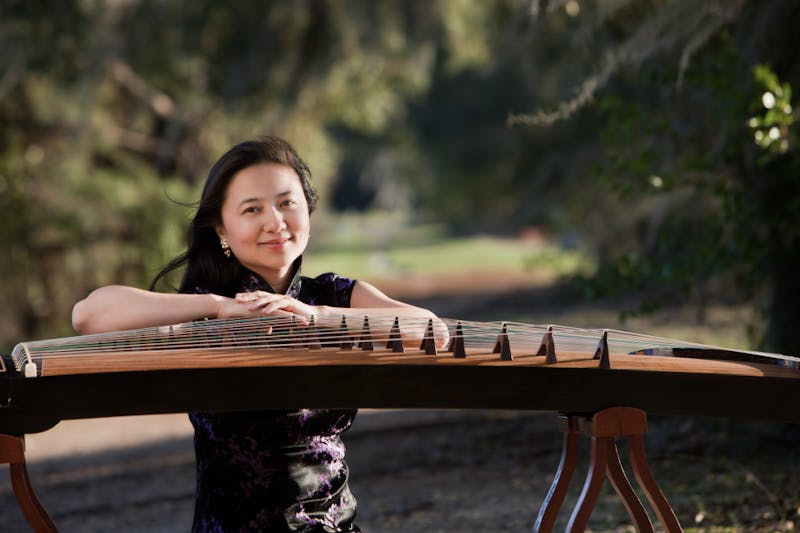 Listen to the art of guzheng, performed by Haiqiong Deng The Front