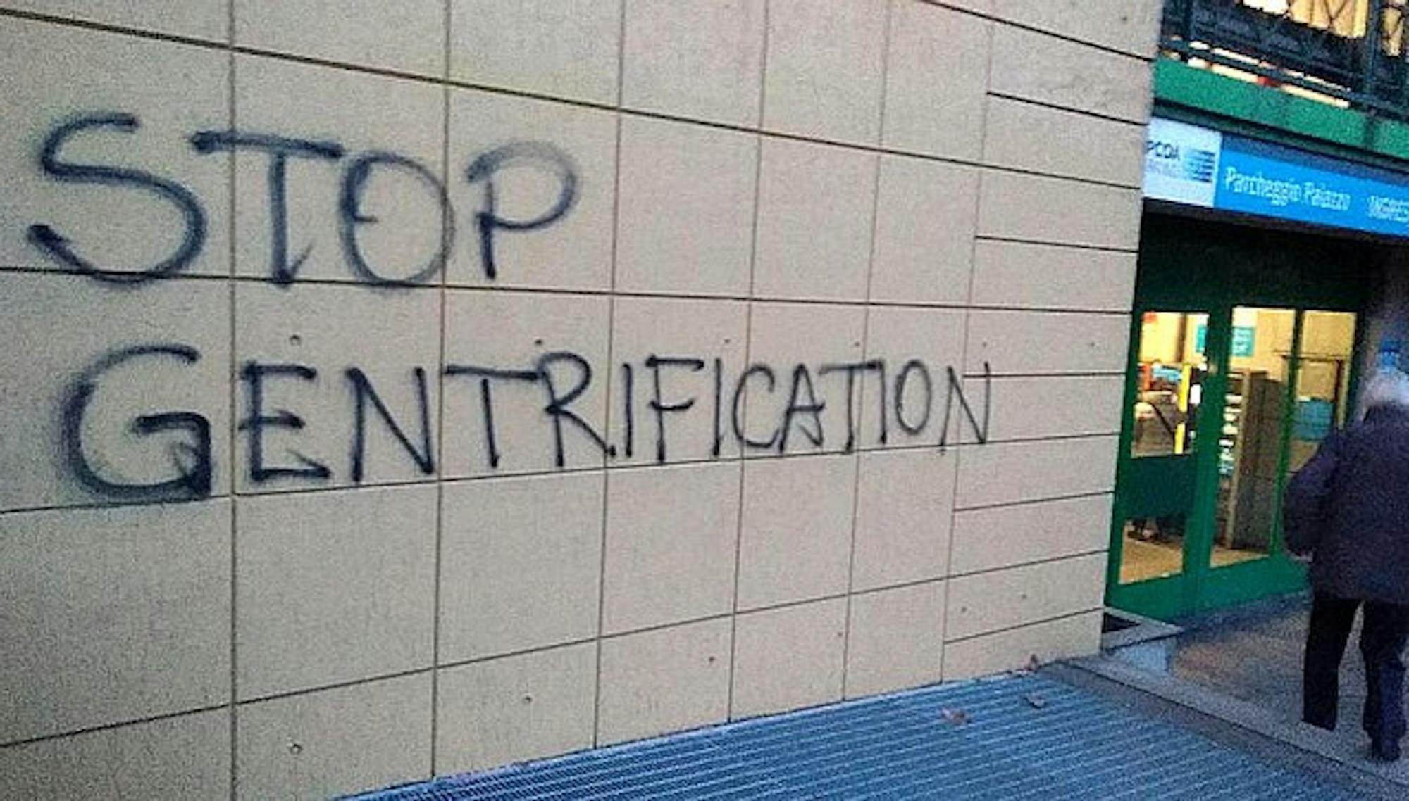 640px-STOP_GENTRIFICATION_graffiti_in_Turin