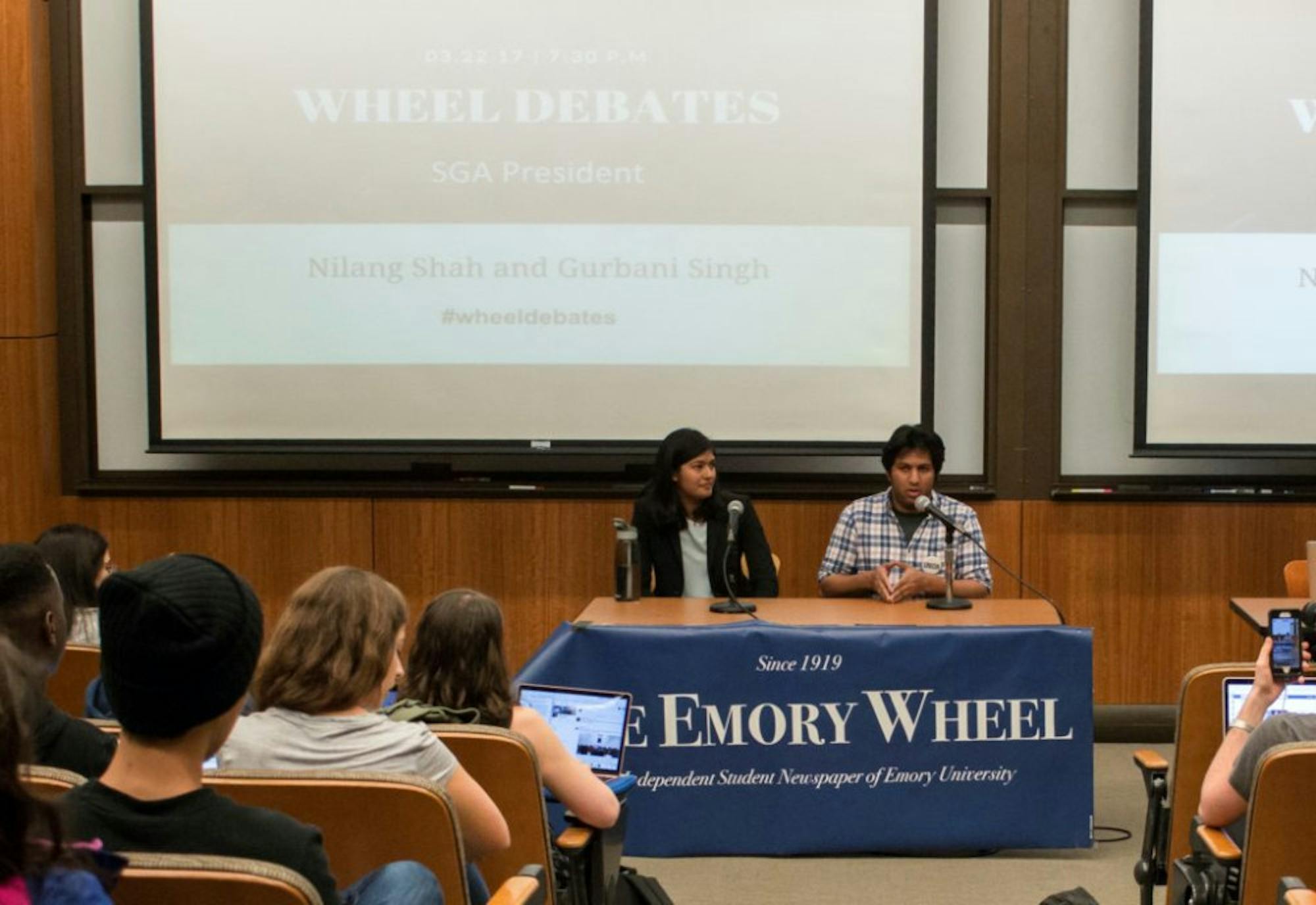 SGA Executive Vice President Gurbani Singh (18B) (LEFT) and Nilang Shah (18B) (RIGHT) defend their platforms for the SGA presidency at the annual Wheel Debates March 22. / Ruth Reyes, Photo Editor