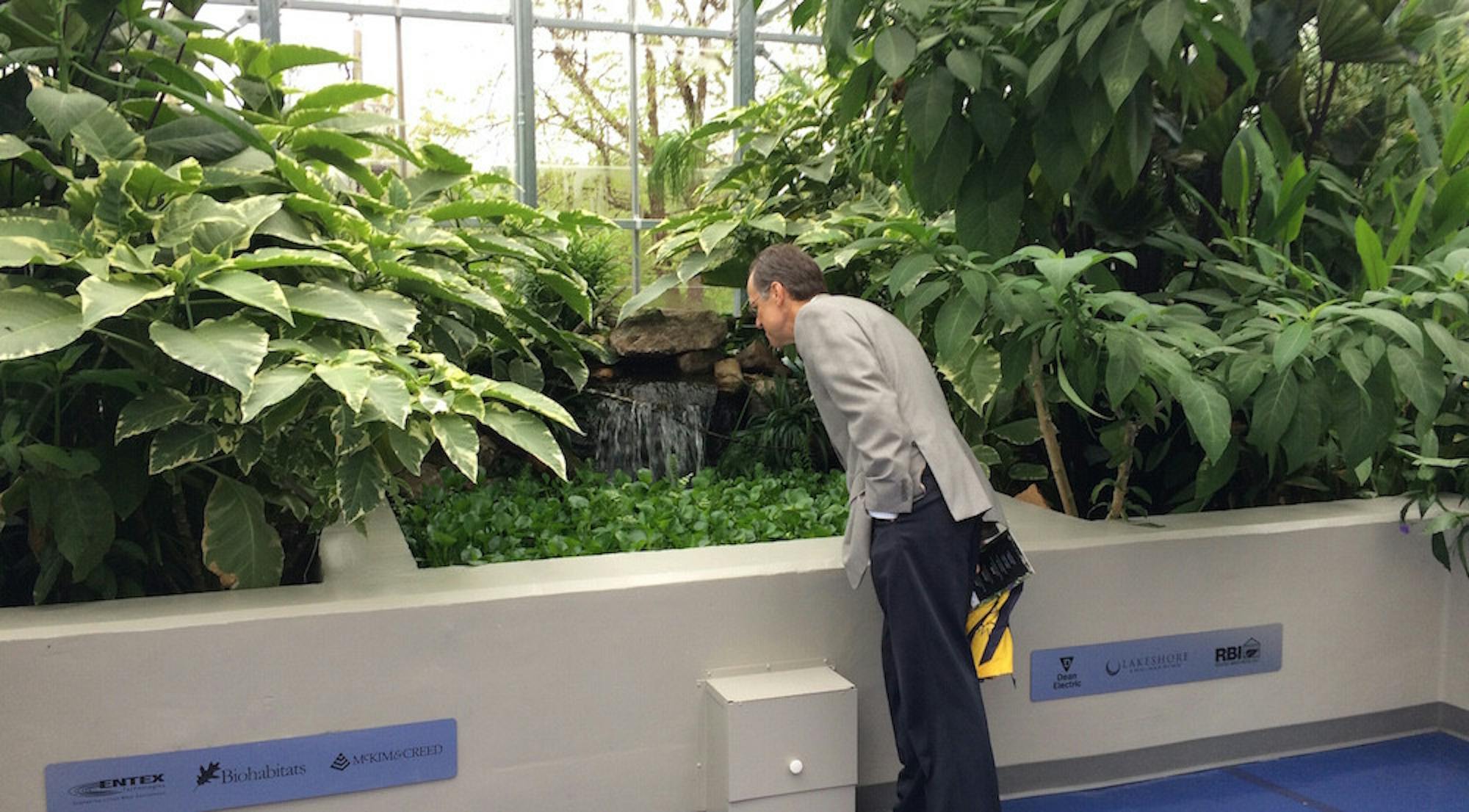 Gary Hauk examines the WaterHub pool. | Photo by Brandon Fuhr, Asst. Digital Editor