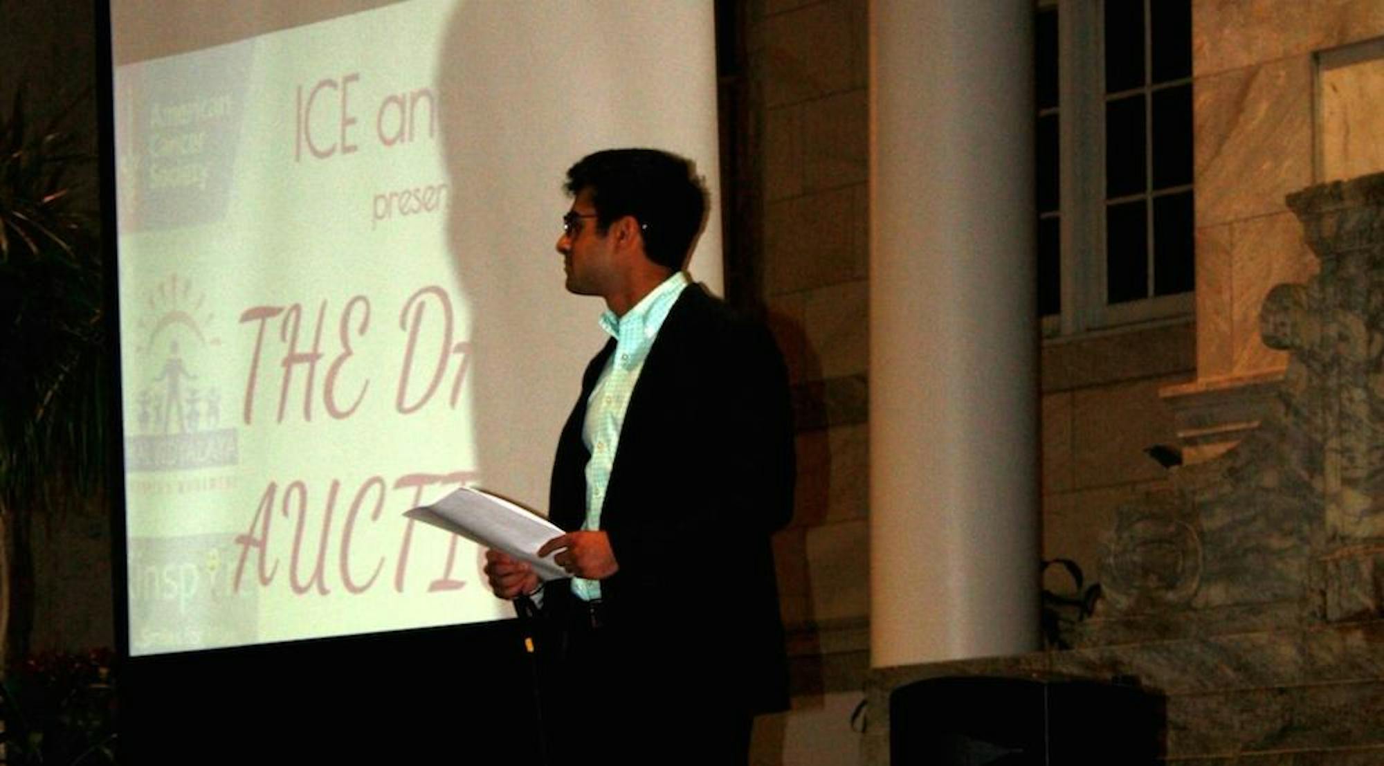 College senior Randy Ahluwalia (above) serves as the master of ceremonies for the Indian Cultural Exchange and Relay for Life date auction on Feb. 11. | Courtesy of Indian Cultural Exchange