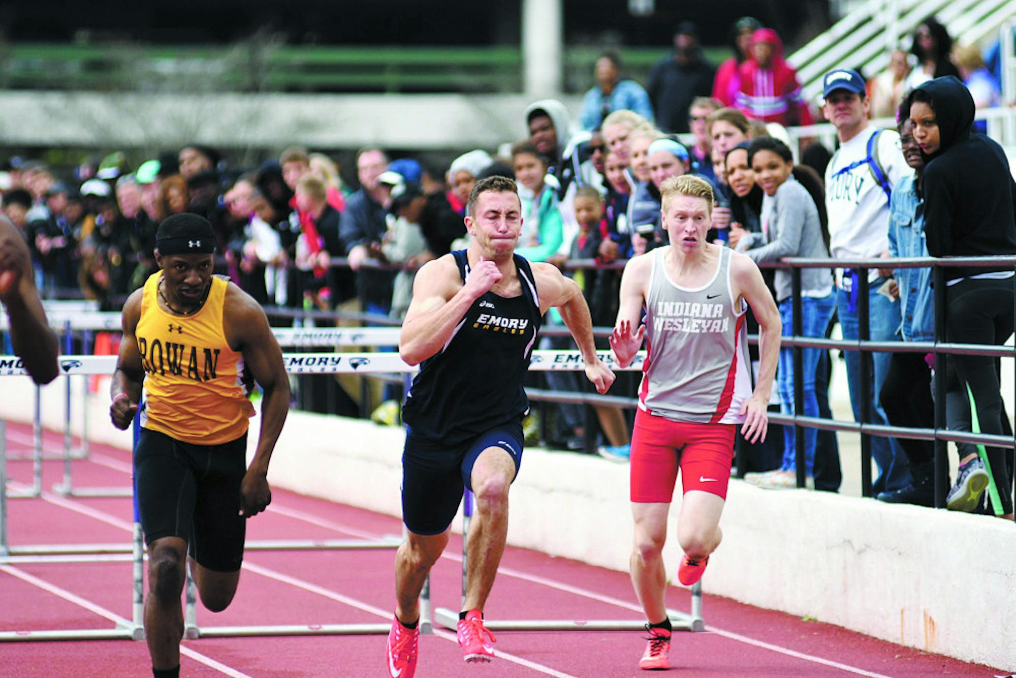 Junior Benjamin Rogin races ahead to a fourth place finish in the 110m hurdles.