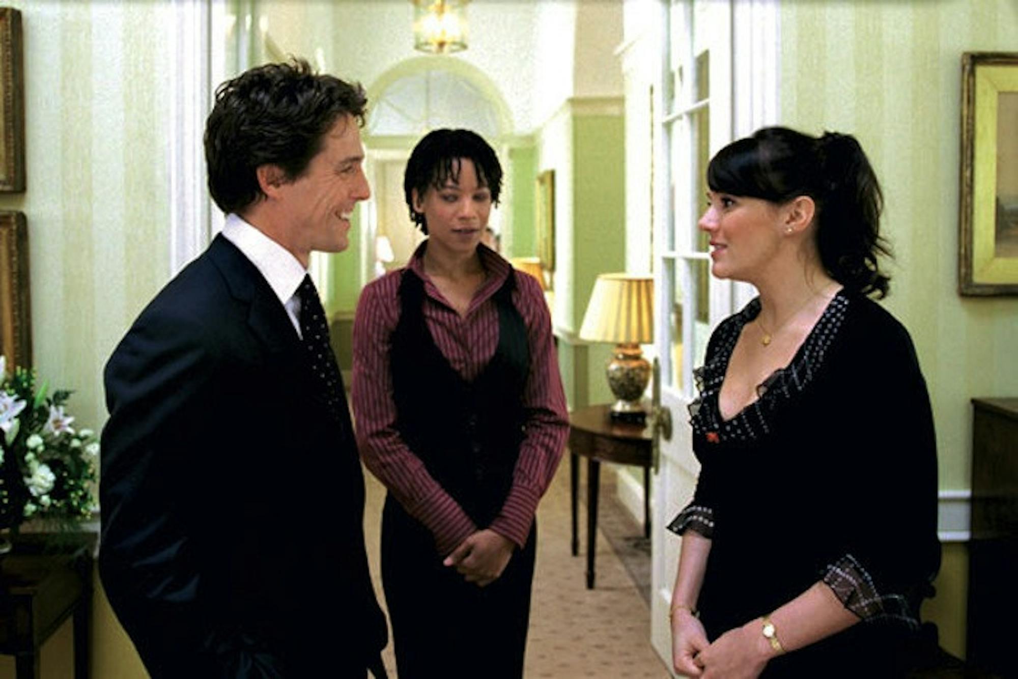 Hugh Grant (left) and Martine McCutcheon (right) in