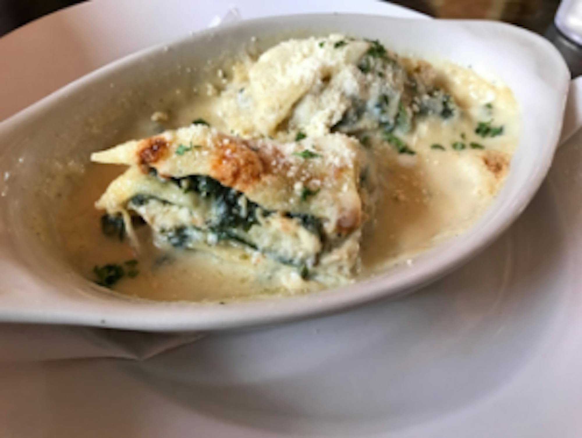 Generously topped with parmesan cheese, Marcello's lasagna exemplifies a non-tomato version of this classic dish. | Courtesy of Mitchell Friedman