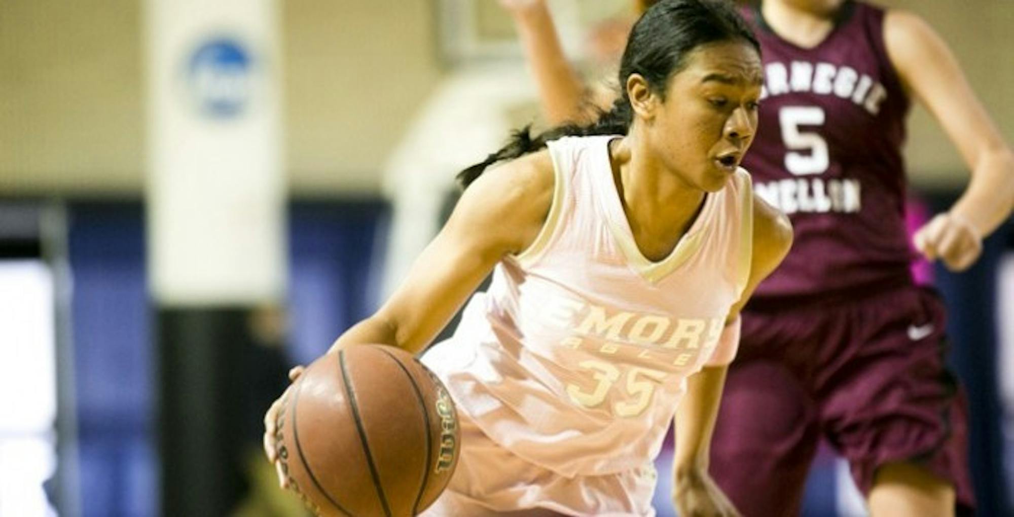 Junior guard Khadijah Sayyid dribbles past the opposition. Sayyid led the Eagles in points and tied with freshman guard Kennede Miller in rebounds with 18 and six, respectively, in the Eagles loss to Kennesaw State University (Ga.). | Photo Courtesy of Emory Athletics.