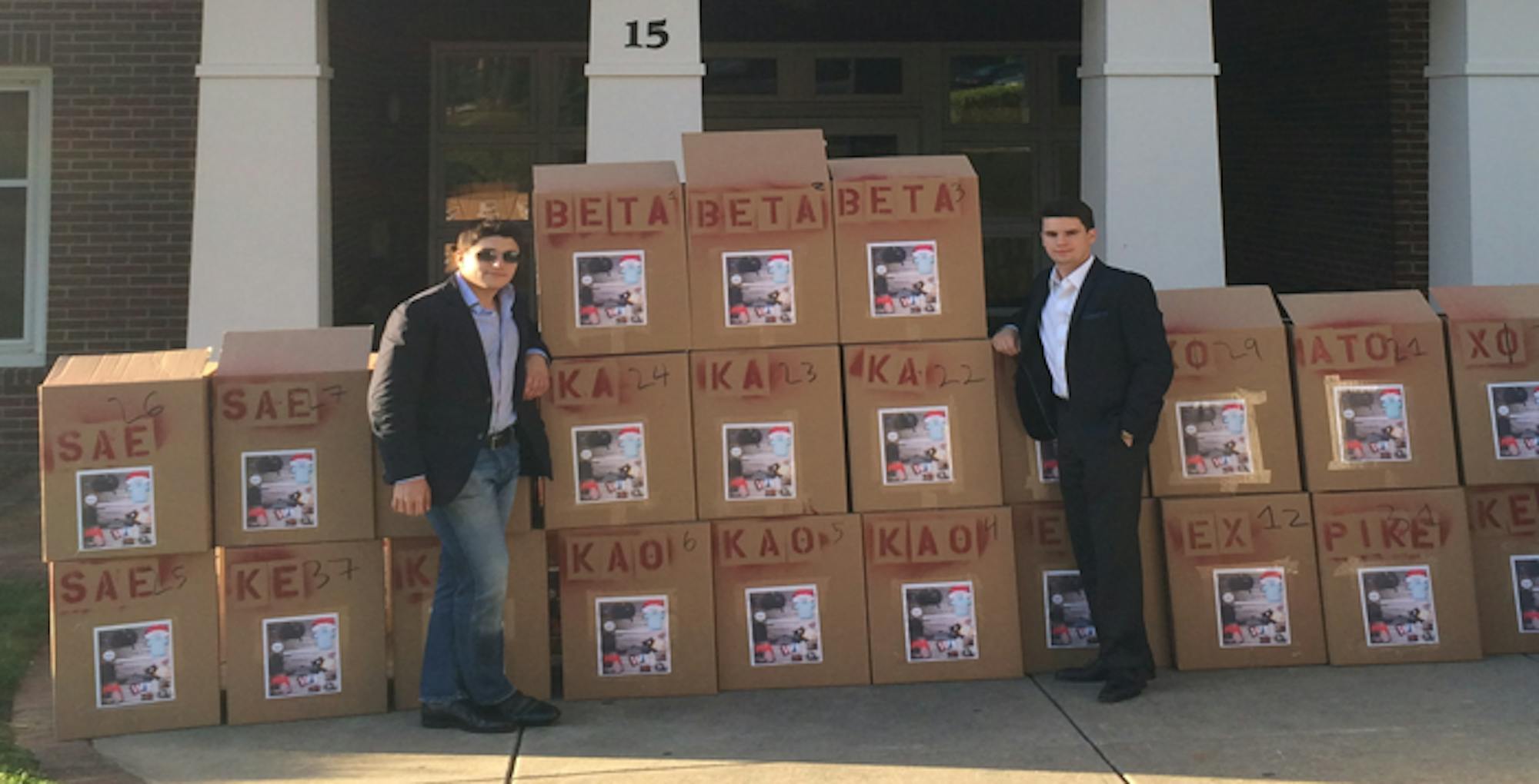 Courtesy of Chris Diglio B-school sophomores and Beta Theta Pi (Beta) brothers Chris Diglio (left) and Griffin Sears (right) placed collection boxes in residence halls, fraternity houses and sorority lodges for Beta's first annual Move Out Clothing Drive.