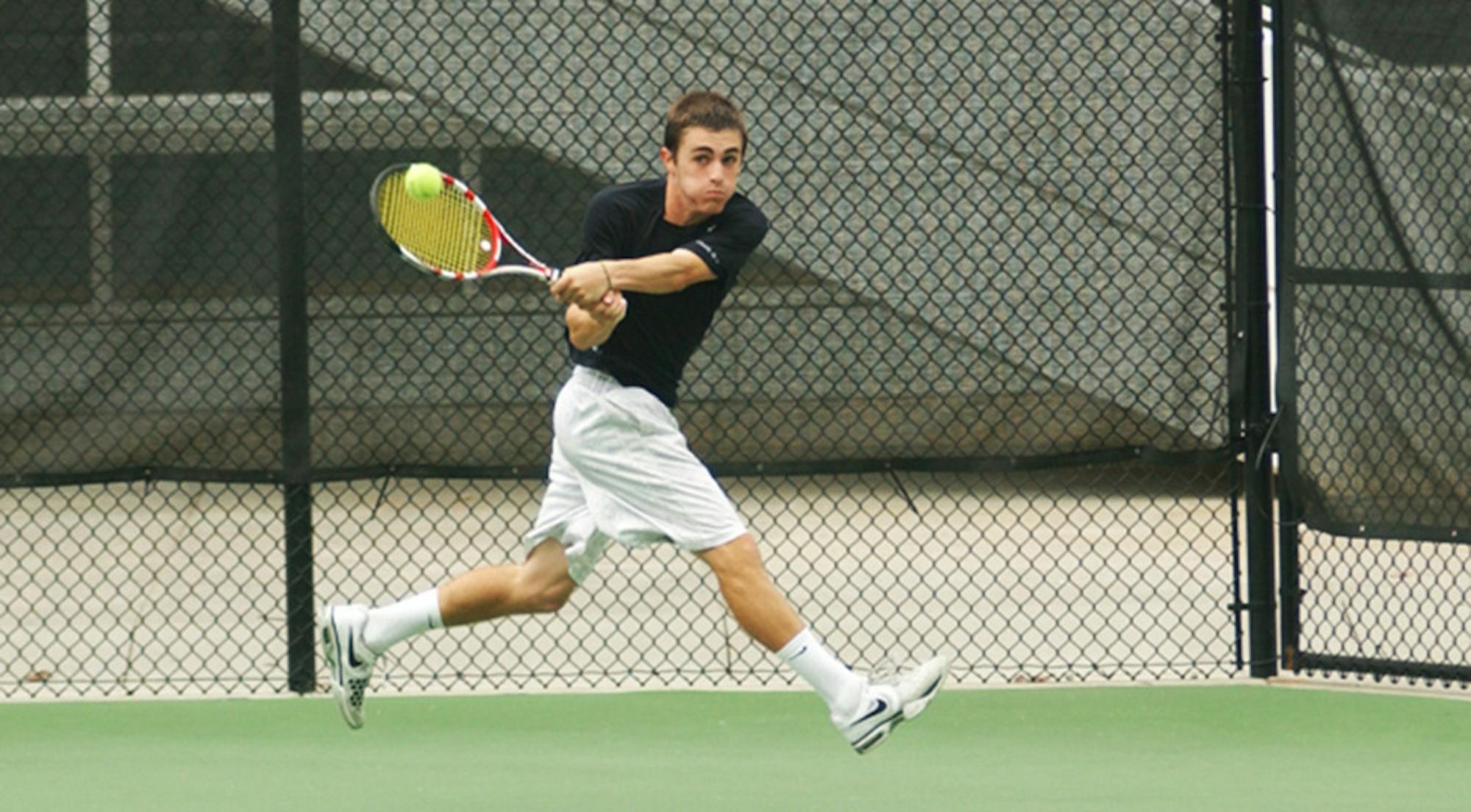 Senior Alex Ruderman returns the ball to his opponent. Mosetick and the Eagles hosted the Savannah College of Art and Design-Atlanta and Aubrn University (Ala.) this past weekend to continue their season.  | Courtesy of Emory Athletics