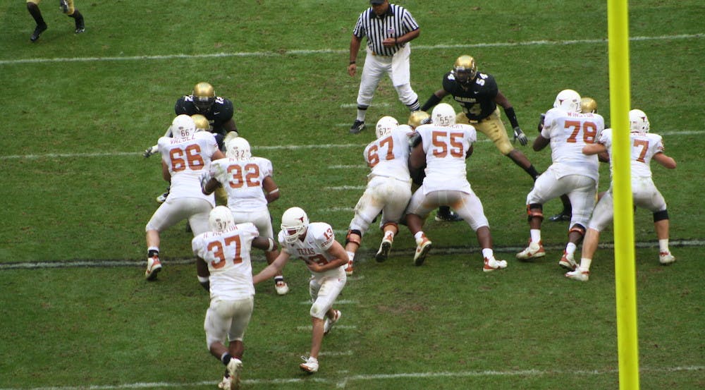 UT_Longhorn_football_-_handoff_to_Melton_in_Big12_championship_game