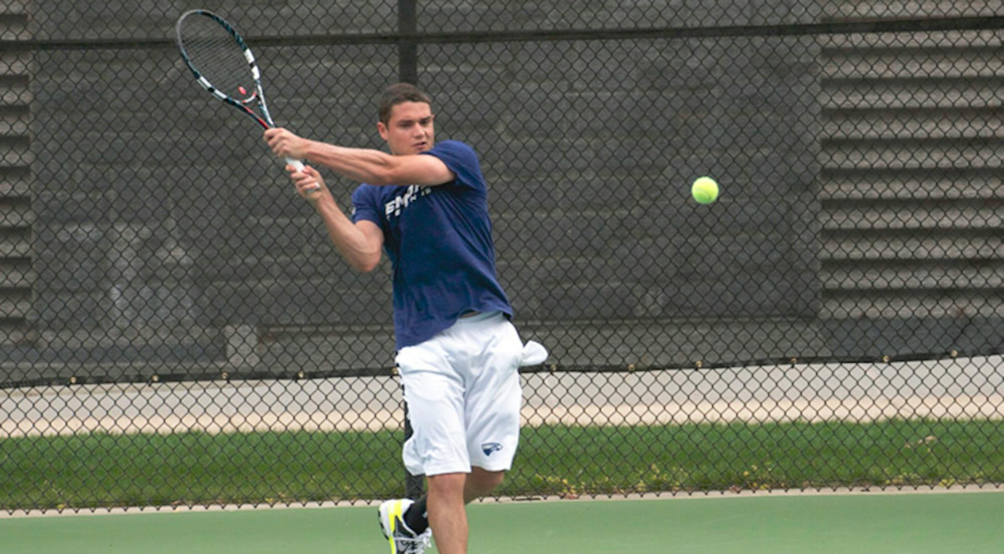 Sophomore Josh Goodman launches the ball back over the net. Goodman and the Eagles won at Sewanee: University of the South (Tenn.) Wednesday. | Courtesy of Emory Athletics