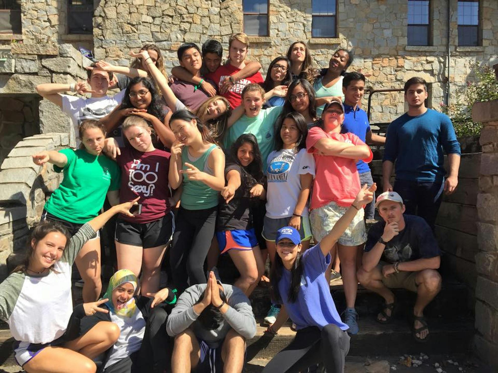 Faraaz Hossain (second row from top, second left from right) and Abinta Kabir (top row, third from right) pose for a photo with the 2015-2016 Student Activities Committee at the Fall 2015 retreat. / Courtesy of Salma Soliman