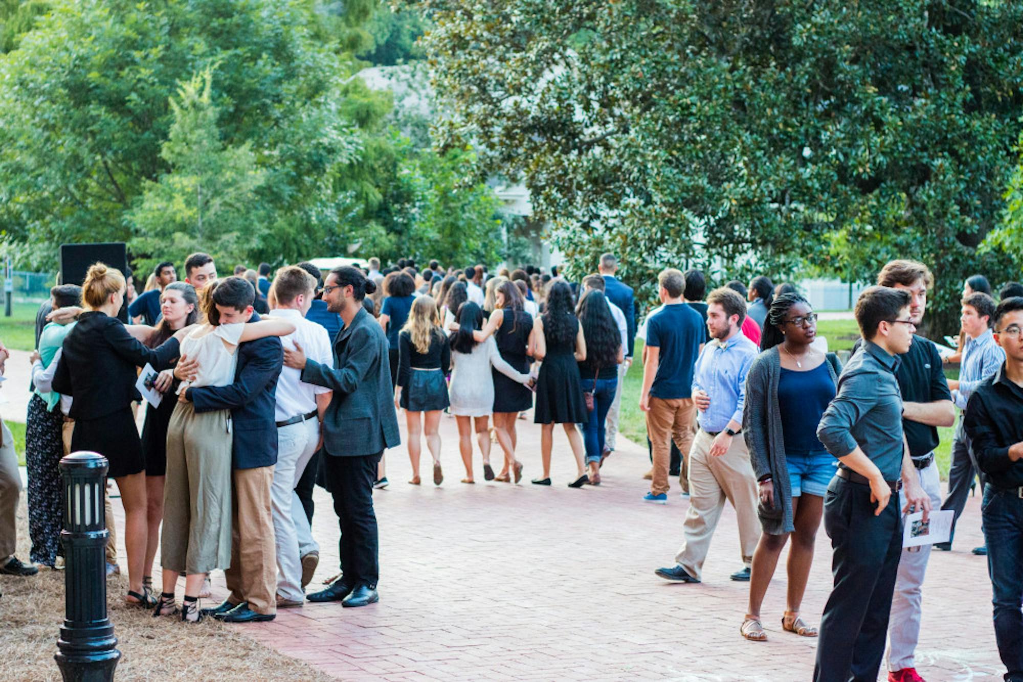 Emory community members mourn at a memorial service for Emory students Abinta Kabir and Faraaz Hossain, who were taken hostage and killed in a terrorist attack in Dhaka, Bangladesh. / Ruth Reyes, Photo Editor