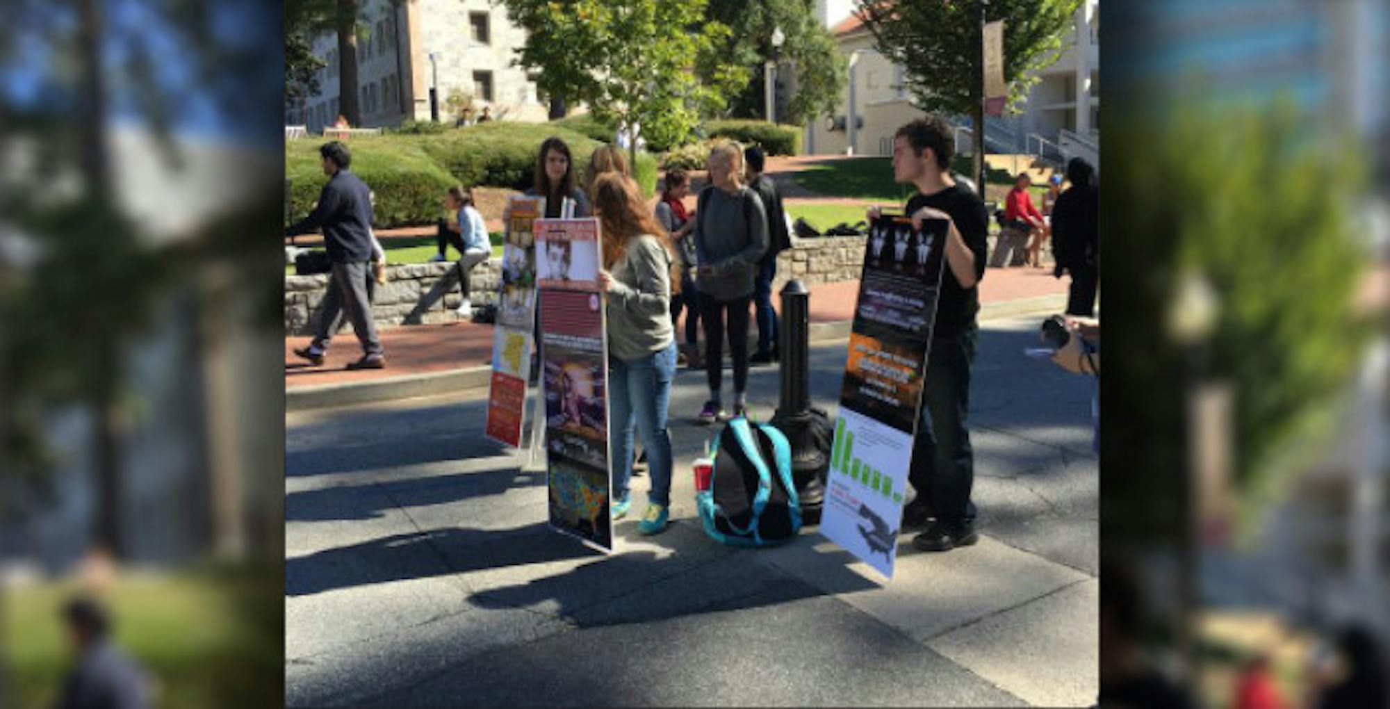 Emory University students supported Thoughtful Thursday by holding up signs with information relevant to sexual trafficking and rape. | Photo courtesty of Matthew Caron