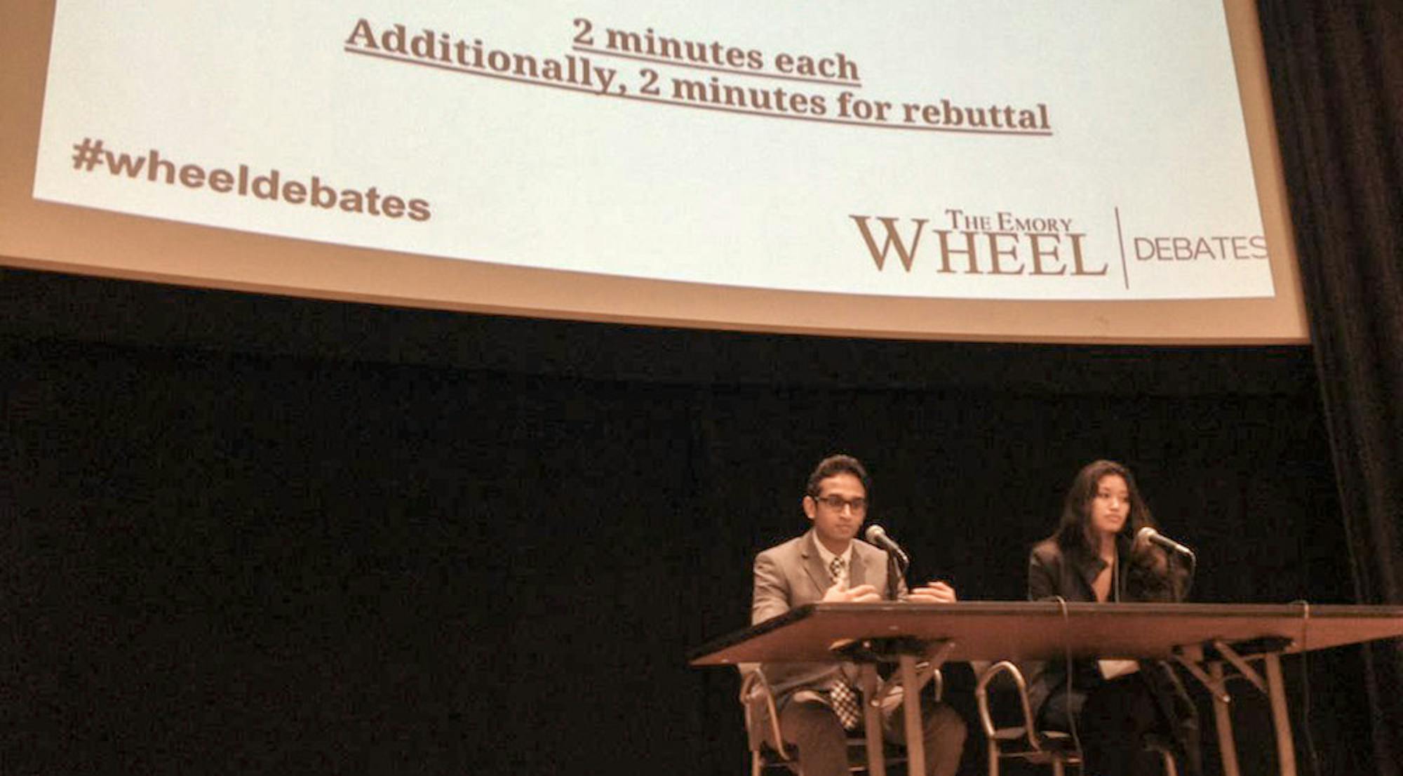 (Left to Right) Raj Tilwa and Elyse Lee talk about their platforms at the Wheel Debates. Photo by Priyanka Krishnamurthy / Editor-in-Chief