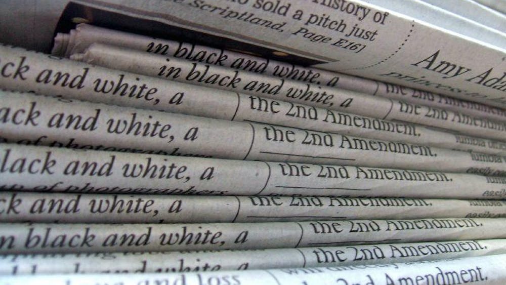 A_stack_of_newspapers.jpg