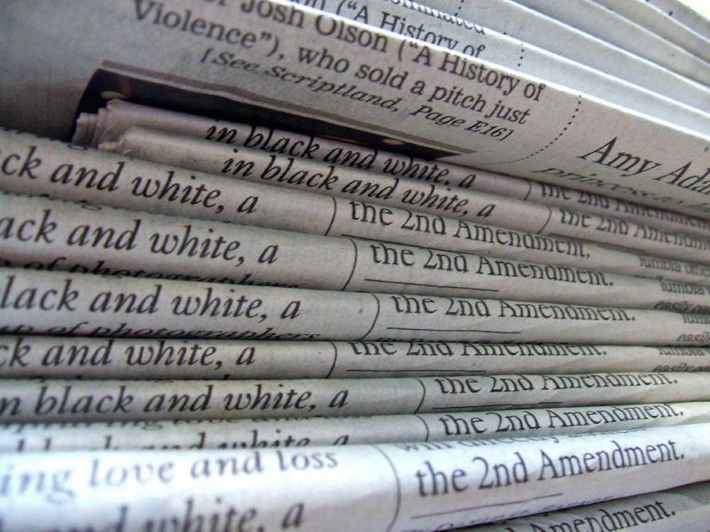 A_stack_of_newspapers.jpg