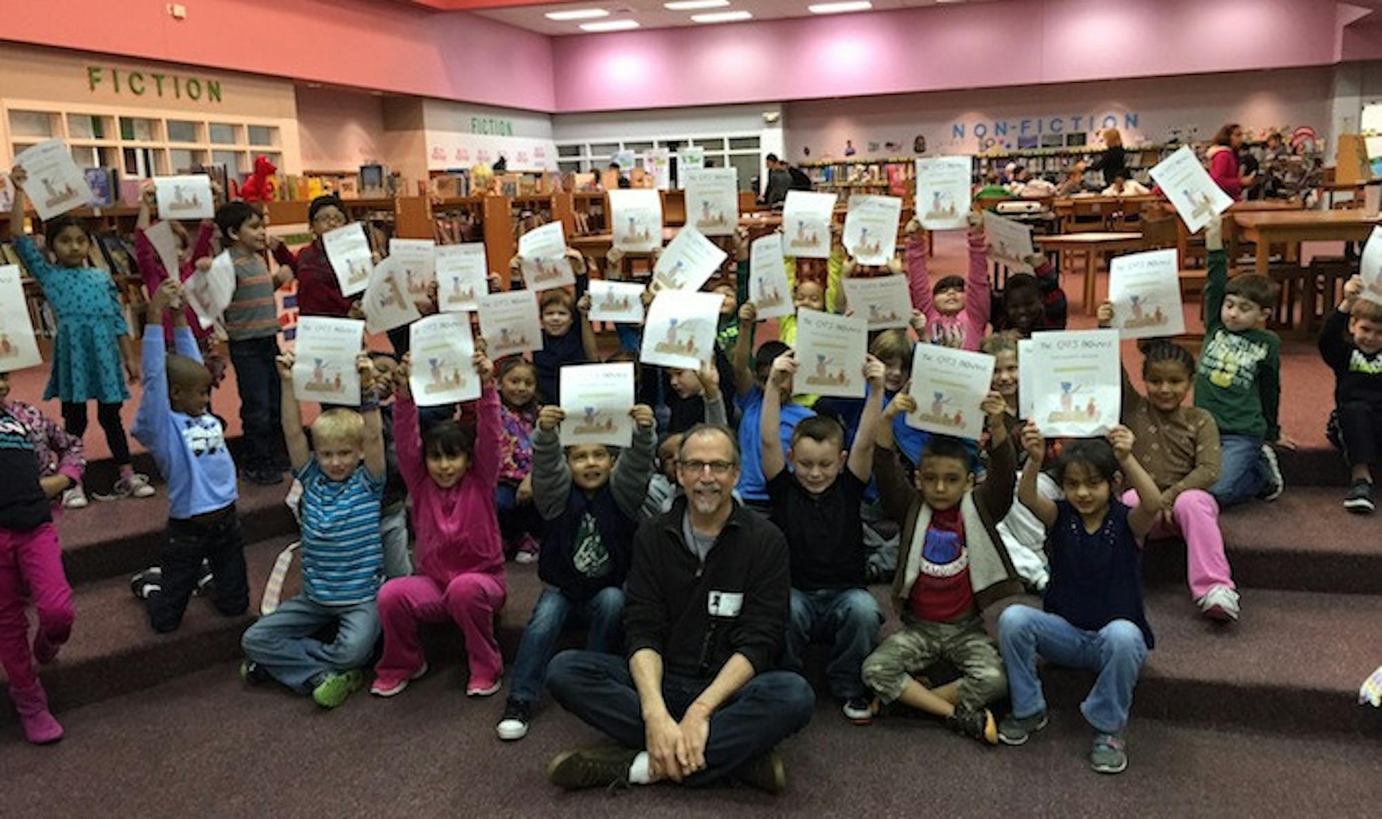 Daniel Wallace reads to elementary school students (kindergarten through second grade) around North Carolina. Above, Wallace presents his writing to students at New Hope Elementary School in Chapel Hill, N.C. | Courtesy of Daniel Wallace