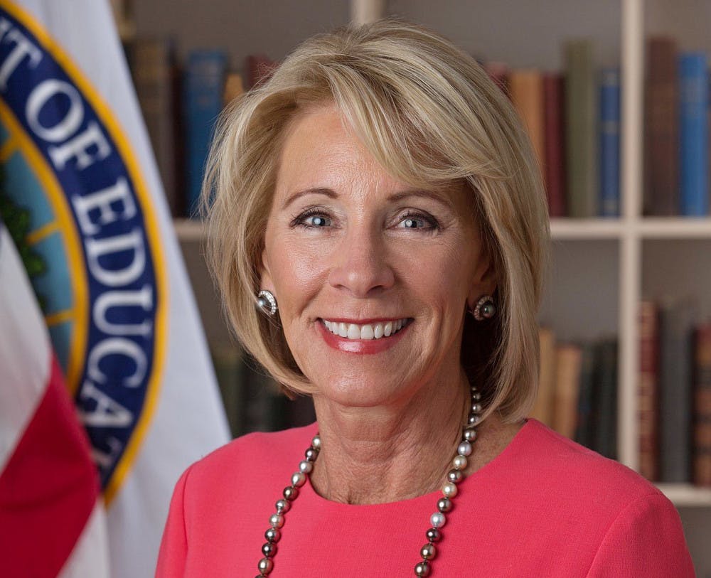 1280px-Betsy_DeVos_official_portrait-e1505145503227