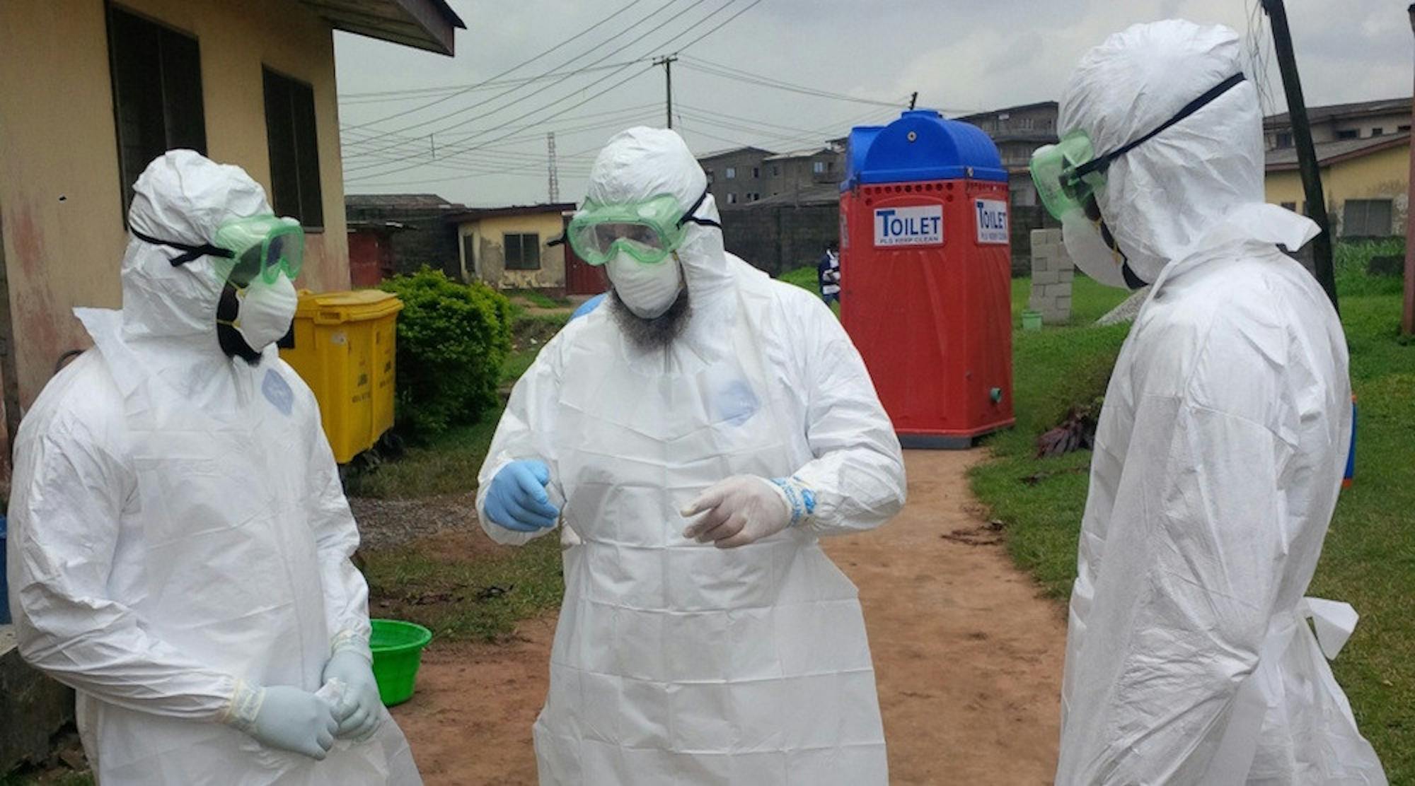 Nigerian physicians being trained by the World Health Organization (WHO) on how to put on and remove personal protective equipment (PPE) to treat Ebola patients. Photo courtesy of Wikimedia commons