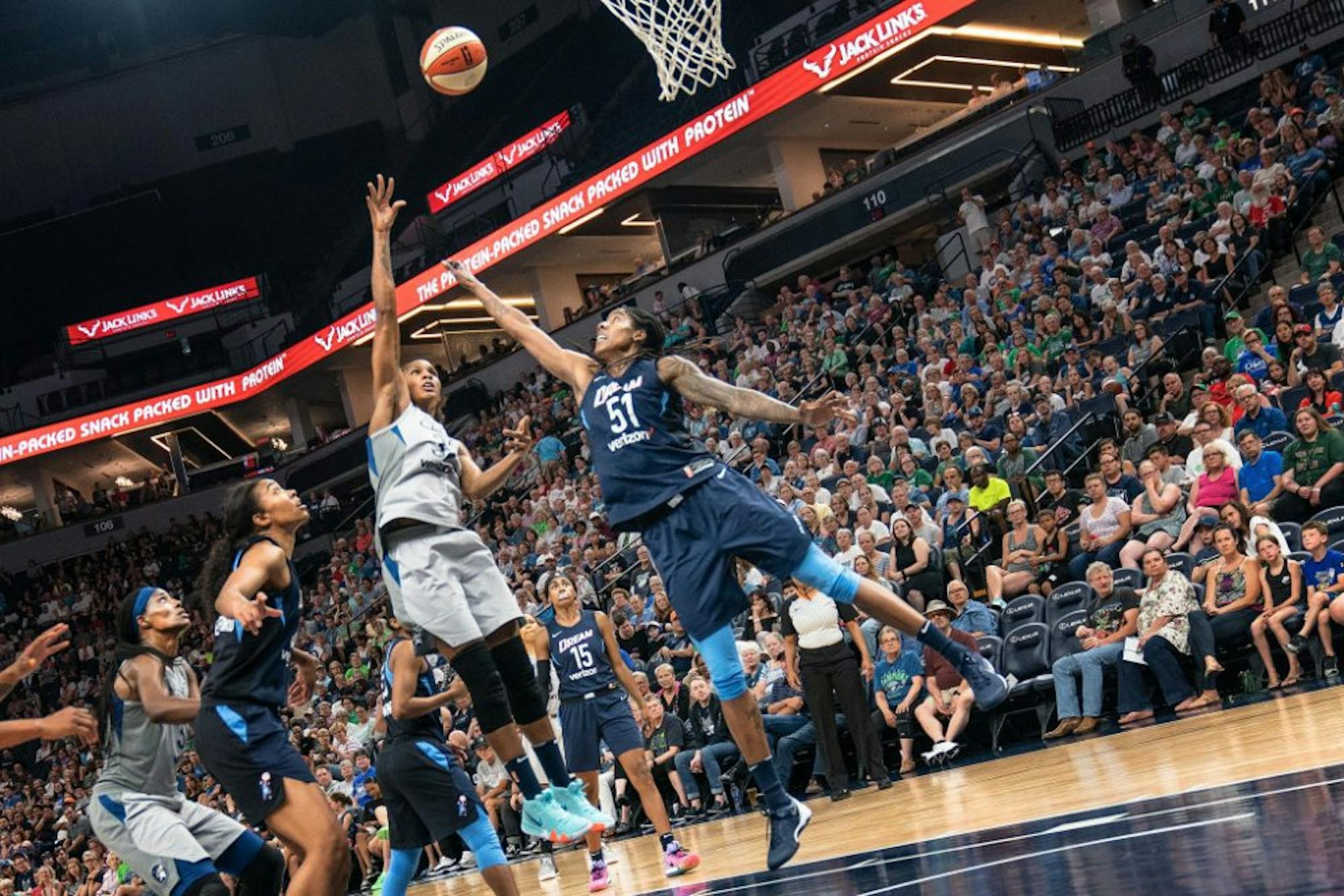 Rebekkah_Brunson_shoots_as_Jessica_Breland_attempts_to_block_the_shot_in_the_Minnesota_Lynx_vs_Atlanta_Dream_game-1024x683