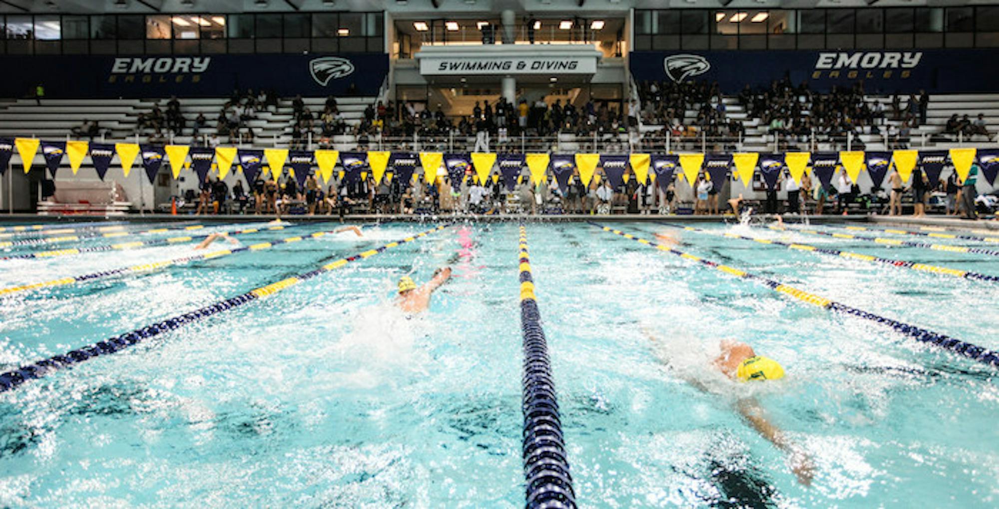 The Eagles swim against the University of North Carolina (UNC)-Wilmington in the WoodPEC for a Alumni and Family Weekend crowd. The women's team defeated UNC-Wilmington, 152-142, while the men lost 157-131. The teams take on Birmingham-Southern College away this Saturday. | Photo Courtesy of Jason Oh