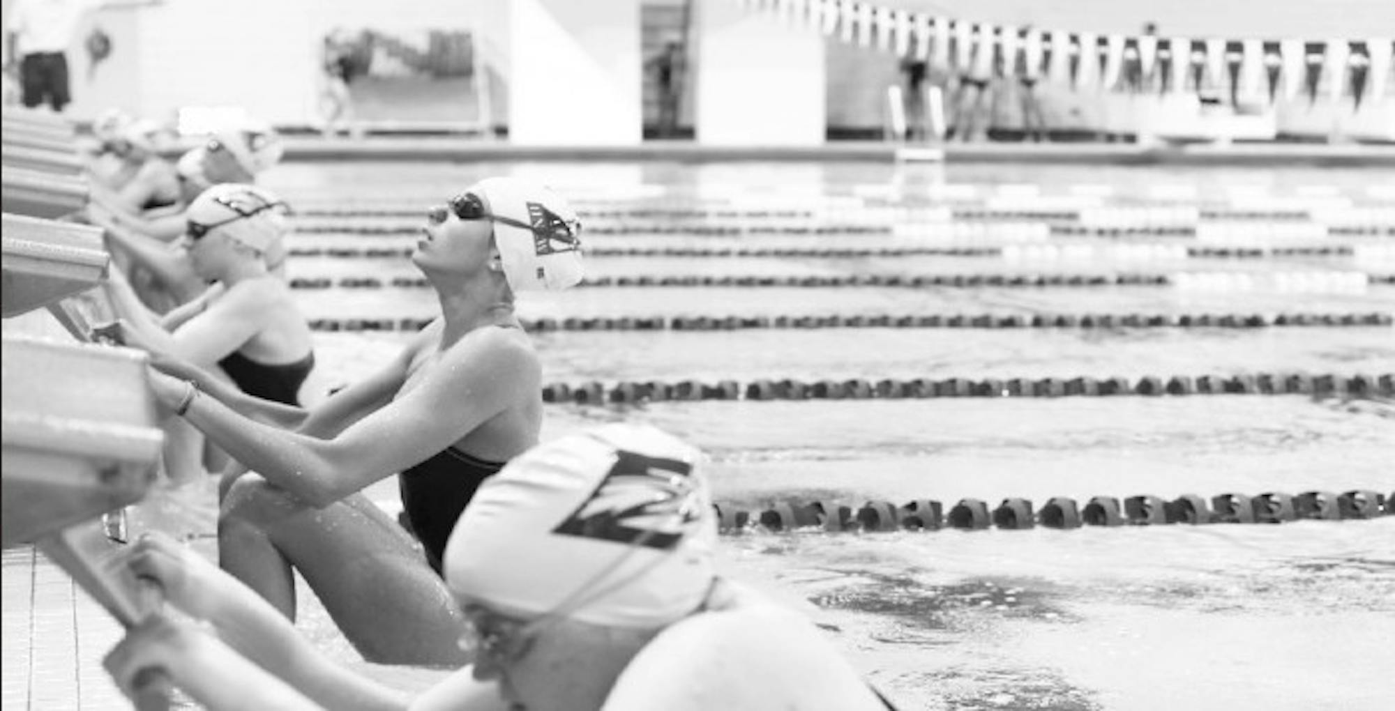 Jason Oh/Staff Members of the Emory women's swimming team wait in anticipation of the starting beep. The men's team defeated the Savannah College of Art and Design (SCAD), while the women's team defeated both SCAD and Brenau University (Ga.) last Saturday. | Photo by Jason Oh/Staff.