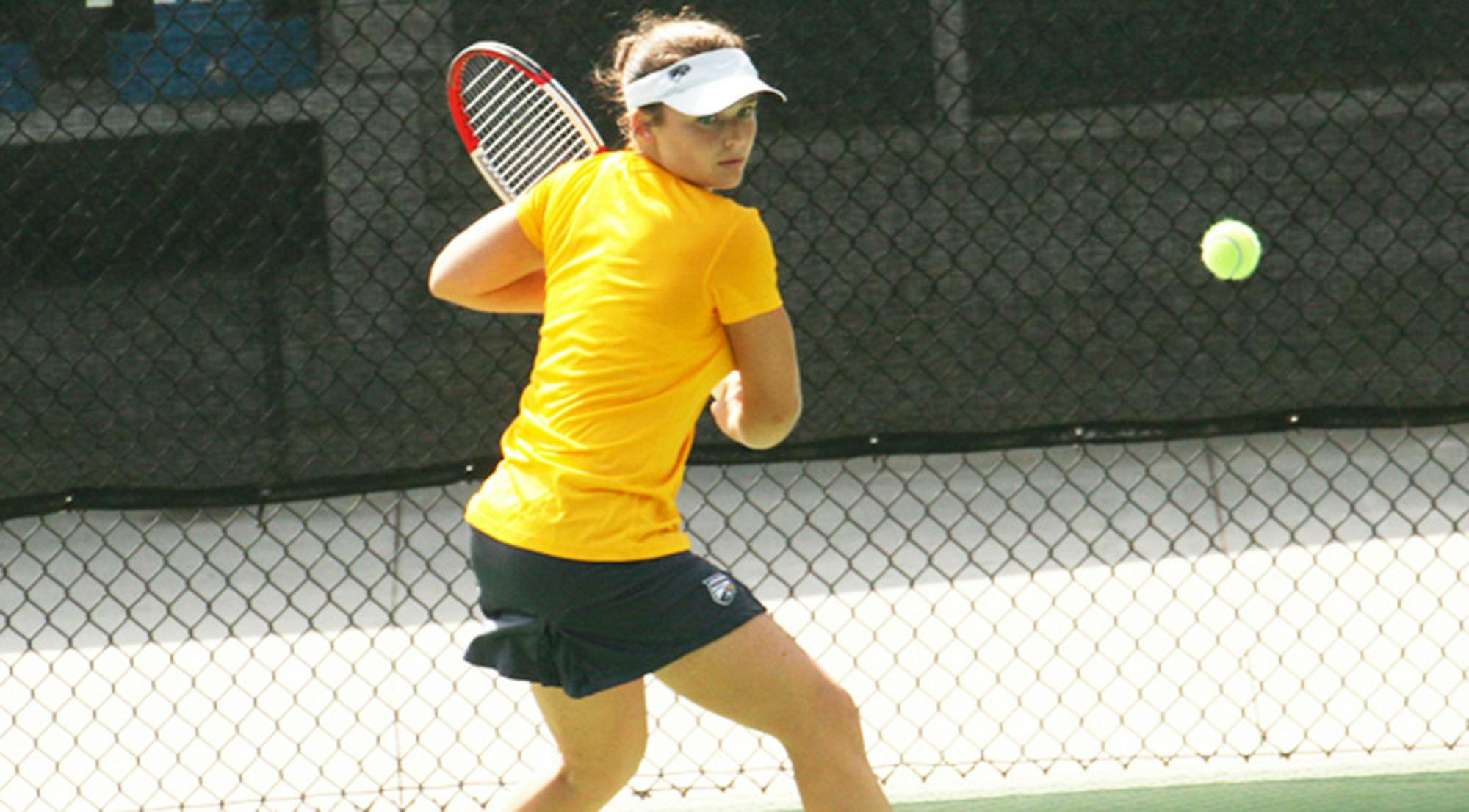 Freshman Bridget Harding squares up to the ball. Harding won her singles sets against Oglethorpe University (Ga.) last Sunday and Georgia Gwinnett College Thursday. The Eagles are now 5-1 on the 2015 season.  | Courtesy of Emory Athletics