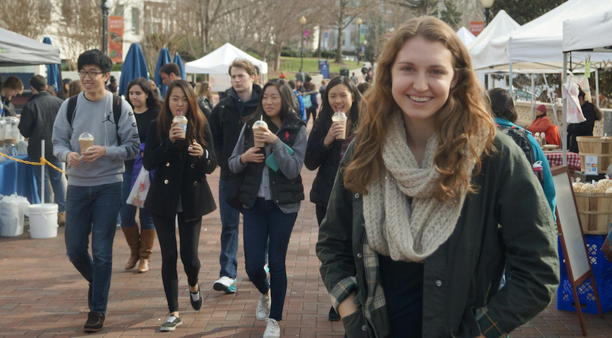 College junior and Vice President of Sustainability for the Food Advisory Committee at Emory Hannah Dugoni stands at the Emory Farmer's Market, future home of Emory Local Roots, an initiative she started to bring local foods weekly to Emory students. | Stephen Fowler, Student Life Fowler