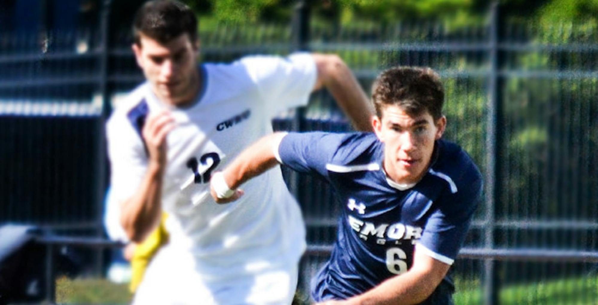 Junior midfielder Nick Schook chases down the ball. Schook scored the Eagles' only goal in their 1-0 win over Case Wastern Reserve University (Ohio) last Sunday, which improved their record to 13-3-1. | Photo by Erin Baker/Staff