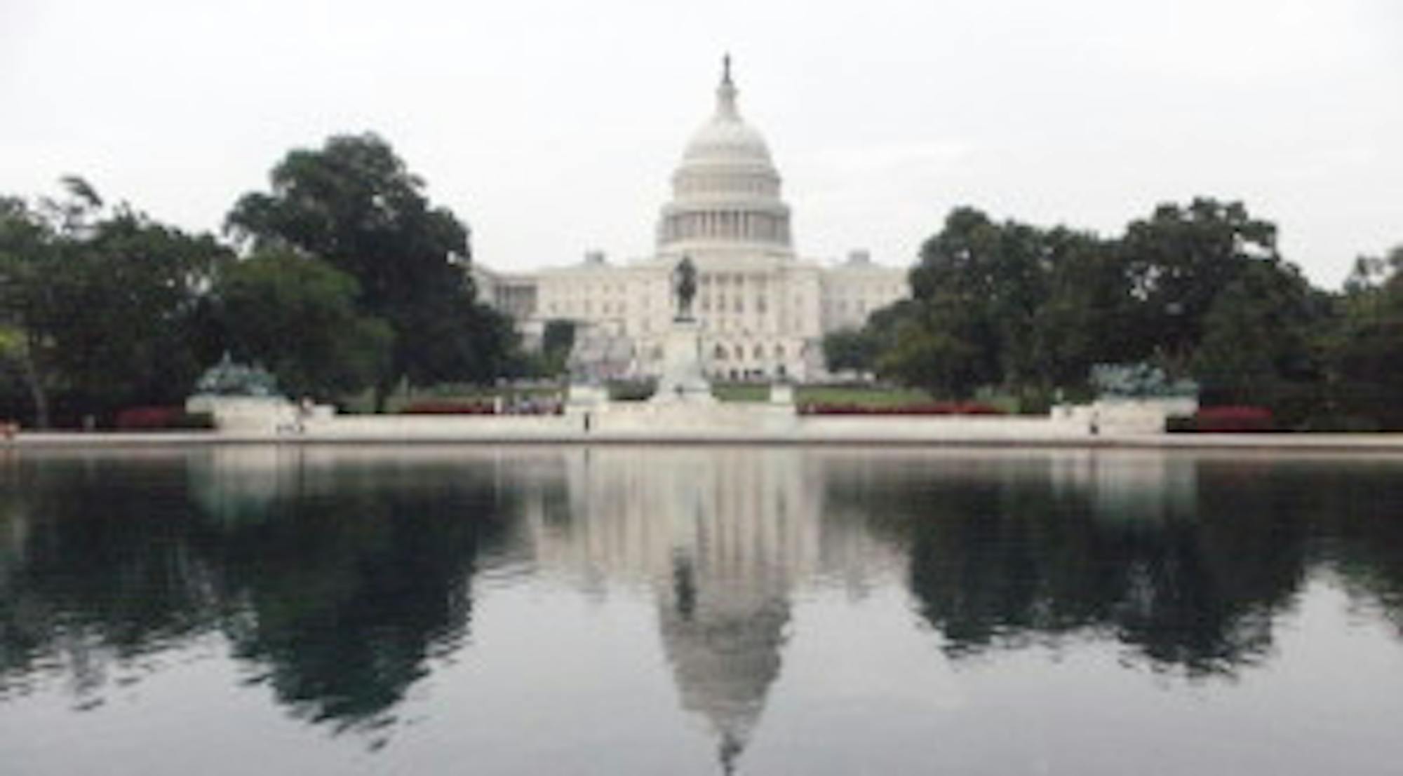 Rear_of_U.S._Congress_on_the_Capitol_reflecting_pool-300x166