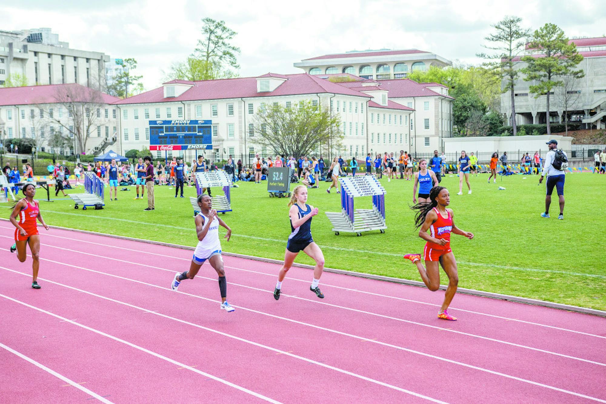 Freshman Kaitlyn Leonard (Center) races in the women's 400m dash. Leonard finished No. 17 in the event with a time of 59.35. Matthew Hammond/Senior Staff