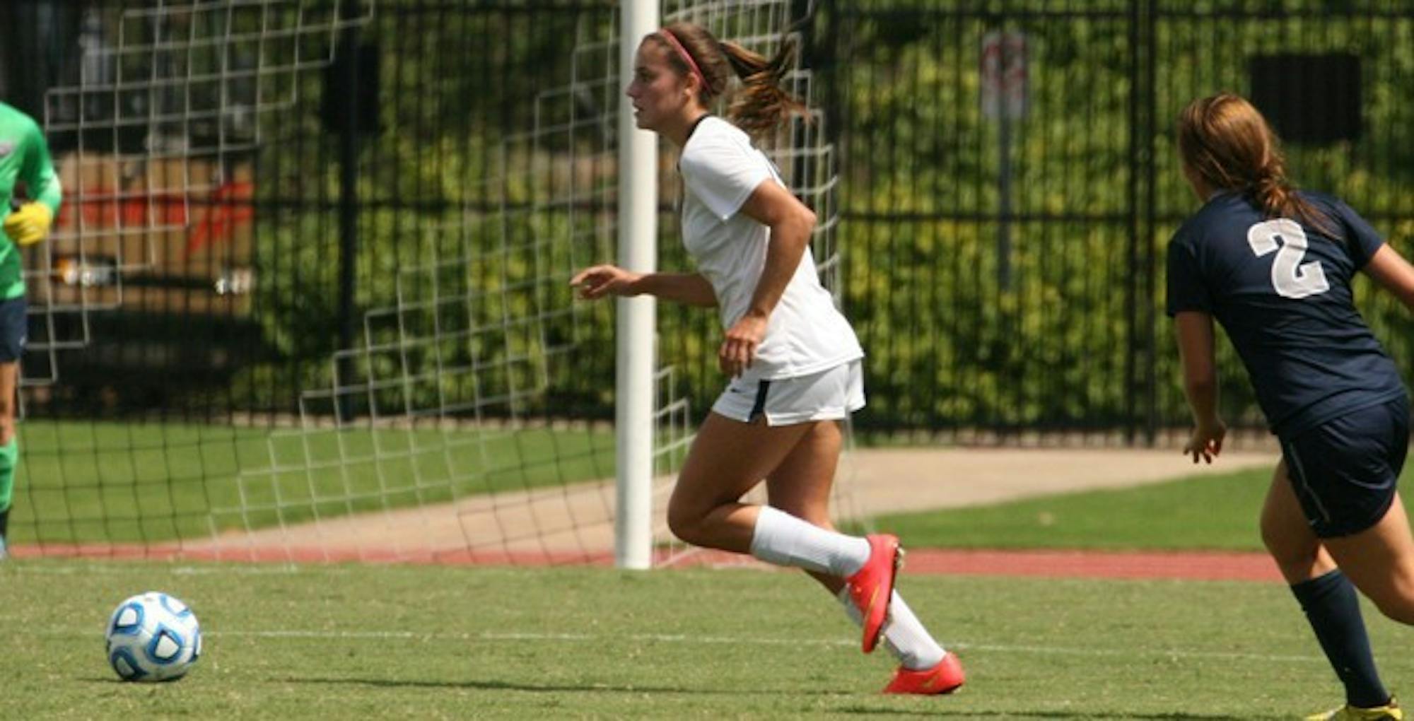 Sophomore Bailey Plummer rounds the ball. After losing one and tying two of their last three games,  Plummer and the Eagles shutout LaGrange College (Ga.) 9-0 last Wednesday. | Courtesy of Emory Athletics